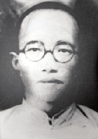 王尚德像.  新华社发